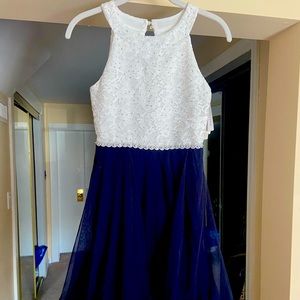 Beautiful sequence laced top with larger stones around waist.